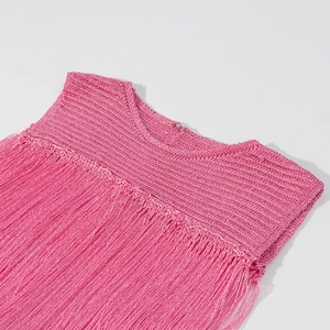 Detail shot of the pink knitted vest showing high-quality fabric texture and fringe tassels