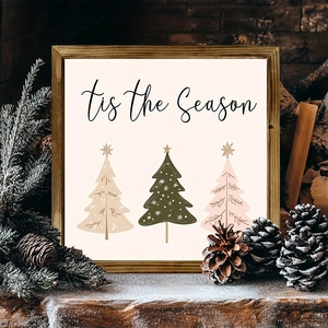Detail of wooden Christmas tree frame featuring 'tis the Season' text and snowflakes