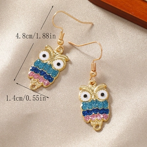 Cute colorful owl drop earrings with gold frame and size dimensions displayed