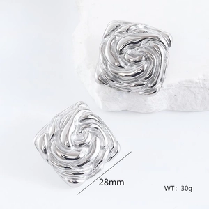 Macro detail of silver square textured earrings with 28mm dimension and 30g weight