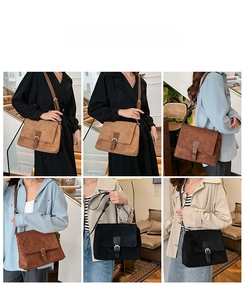 Detail shot of vintage matte suede crossbody bags with adjustable straps in three colors