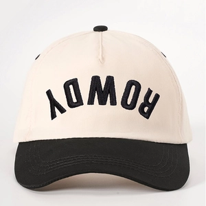 Retro colorblock baseball cap in cream and black with inverted ROWDY embroidery