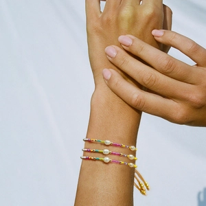 Three-piece set of bohemian Miyuki seed bead bracelets with freshwater pearls and gold beads