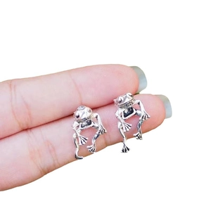 Vintage silver frog stud earrings for women with detailed 3D hollow geometric design