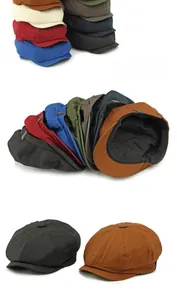 Detailed close-up of retro cotton newsboy hats showing metallic side buckle and top button