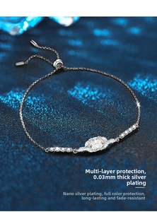 Macro shot of silver moissanite bracelet with multi-layer plating and adjustable clasp