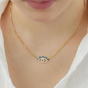 S925 sterling silver gold Evil Eye necklace with blue zircon pendant worn on neck