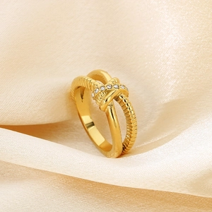 Elegant 18K gold plated stainless steel knotted ring with sparkling inlaid diamonds