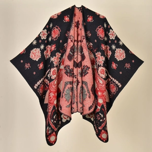 Detail of reversible knit shawl showing ginkgo leaf patterns and premium texture