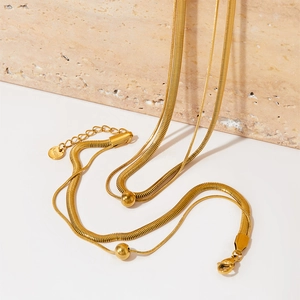 Double layered gold stainless steel snake chain necklace with round bead pendant