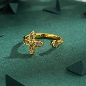 Minimalist four-leaf clover open ring with zircon inlay and gold metallic finish