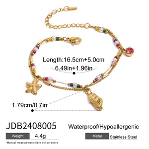 Detail of waterproof stainless steel ocean bracelet with starfish and seashell charms