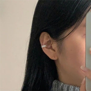 Minimalist silver 925 cuff earring with square zircon shown on a model side profile