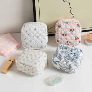 Quilted mini pouches set with floral patterns for makeup, coins, and lipstick storage