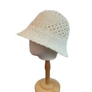 Hollow knit bucket hat for women in beige featuring a diamond crochet pattern design