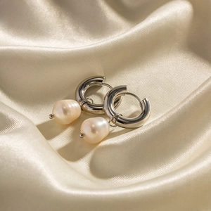 Silver stainless steel hoop earrings with natural baroque pearl drops on silk