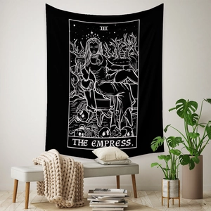 Close-up of The Empress tarot card tapestry showing gothic skulls and occult details
