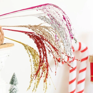 Sparkly sequin Christmas willow branches in multiple colors for festive tree decoration