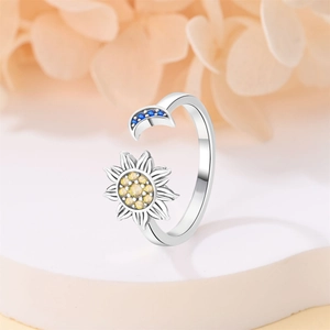 Elegant silver open ring featuring a yellow sunflower and a blue crescent moon design
