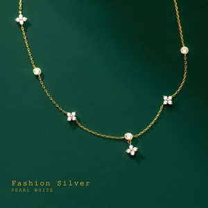 925 silver four-leaf clover necklace in gold finish with white zircon tassel chain