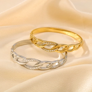 Twisted rope 18K gold plated stainless steel bracelet with sparkling rhinestone inlay