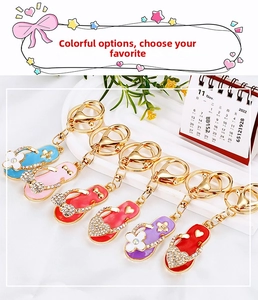 Close-up of sparkling rhinestone flip-flop keychains in multiple vibrant colors
