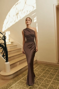 Close-up of elegant chocolate brown satin dress with waist pleats and side draping details