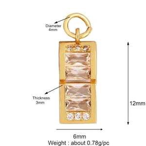 Detail of gold rectangular jewelry pendant with white zircon stones and size dimensions