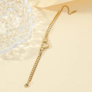 Luxurious gold stainless steel heart bracelet with Cuban chain and lobster clasp closure