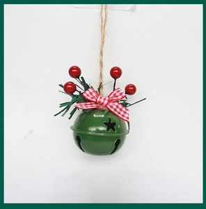 Detailed view of forest green Christmas bell with red berries and plaid bow decoration