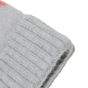 Close-up of soft grey knit winter hat showing plush mohair texture and fiber detail