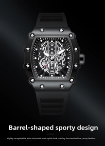 Macro shot of a black tonneau-shaped sports watch featuring a hollow skeleton dial