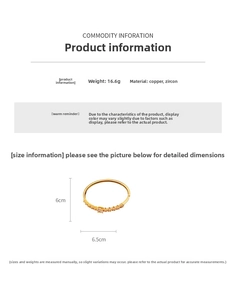 Detail view of gold-plated copper flower bracelet with zirconia pave and 6x6.5cm dimensions