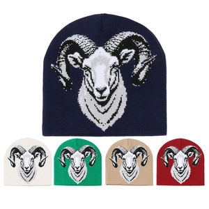 Knitted beanie collection showing five colors with detailed ram head jacquard pattern
