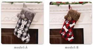 Detail of plaid pet Christmas stockings with plush collars and bone patterns by a fireplace