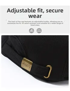 Detail of adjustable bronze buckle with Sport engraving on corduroy baseball cap