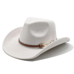 Detail of white western cowboy hat with brown leather band and gold buckle accent