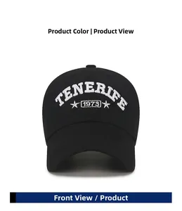 Detailed front view of black cotton baseball cap with white Tenerife 1973 embroidery