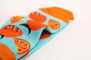 Vue macro détaillée de la texture du coton avec tissu épais et motif d'orange