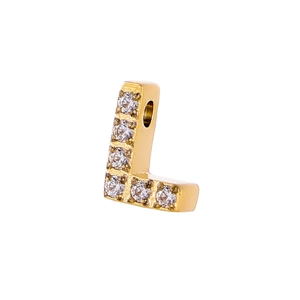 Macro shot of gold-plated letter L pendant with micro-paved cubic zirconia crystals