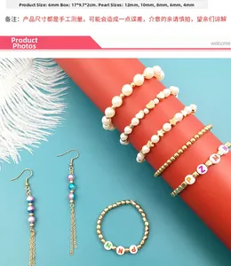 Detail of DIY jewelry kit featuring assorted pearls and star beads on a turquoise surface