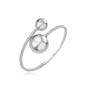 Detail of silver silver cuff bracelet with pavé cubic zirconia and dual metal spheres