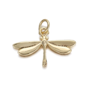 Macro view of 18K gold plated dragonfly pendant featuring detailed wings and a polished finish