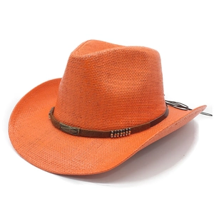 Bright orange woven straw cowboy hat featuring a vintage metal buckle and brown leather band