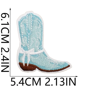Detail view of light blue cowboy boot embroidery patch with 6.1cm x 5.4cm dimensions
