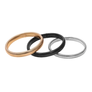 Set of three elastic metal sleeve garters in gold, black, and silver finishes