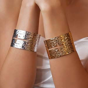 Hammered metal open cuff bracelet with hollow cross design in gold and silver finish