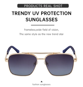 Detailed front view of gold metal frame sunglasses with purple gradient UV lenses