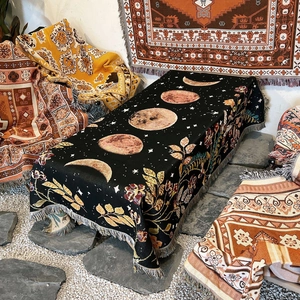 Bohemian moon phase woven throw blanket with floral pattern and tassels for camping