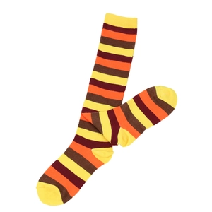 Colorful striped knee-high socks for Thanksgiving, festive orange and yellow striped pattern.